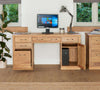 Image of the Baumhaus Mobel Oak Twin Pedestal Home Office Desk (COR06C) with the door and drawer open