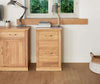 Front angle of the Baumhaus Mobel Oak Desk Height Filing Cabinet (COR07A)