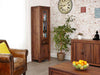 Image of the Baumhaus Mayan Walnut Narrow Glazed Cabinet (CWC01C) shown with other Baumhaus Mayan furniture
