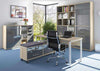 Image of the Maja Set+ Maxi Cupboard Combi in Natural Oak and Grey Glass shown with other Set+ Office Furniture